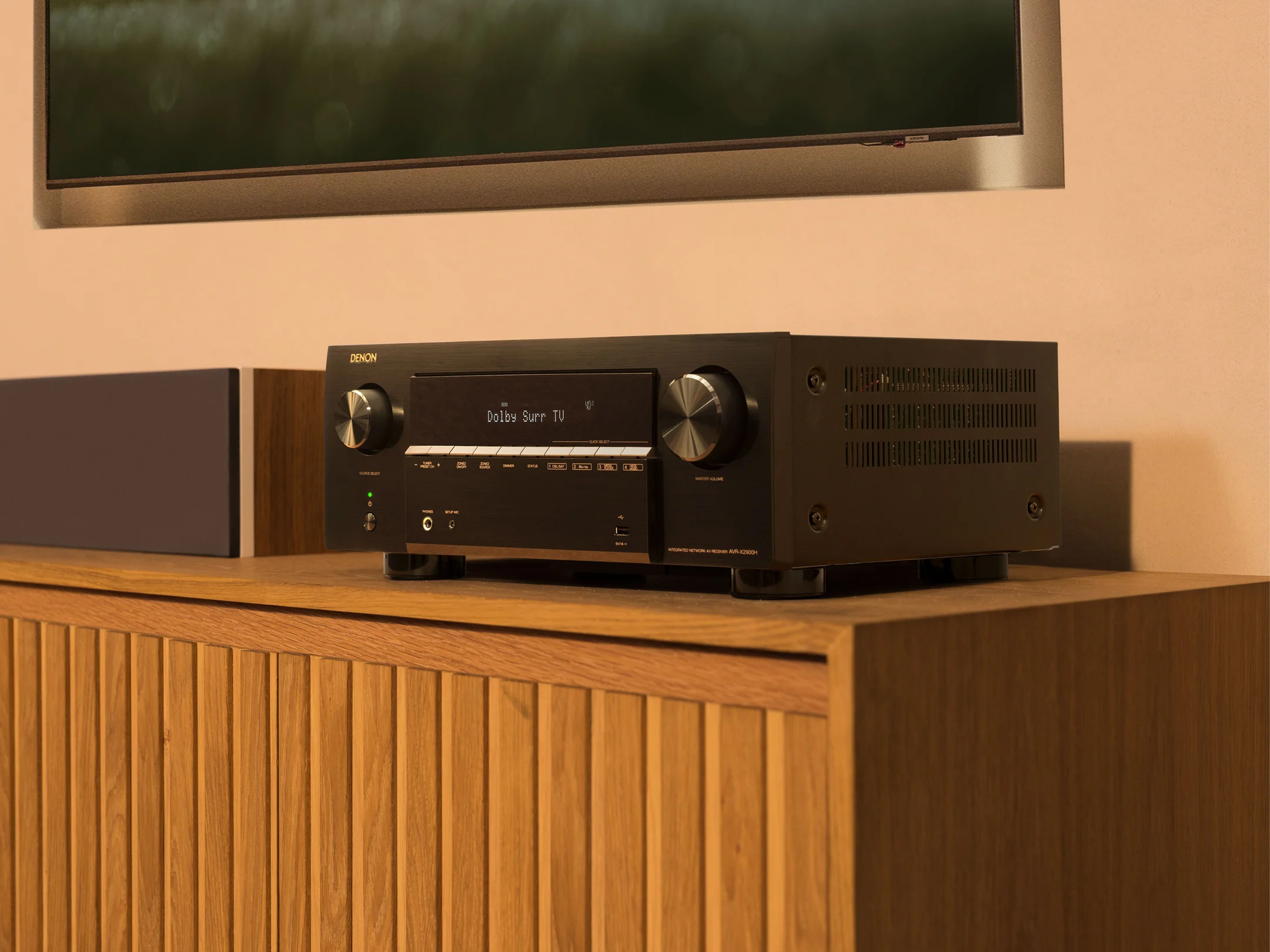 Side view of DENON AVR-X2900HD 7.2 Ch. 95W 4K/8K Dolby Atmos AV Receiver Powered by HEOS  Amplifier - Black