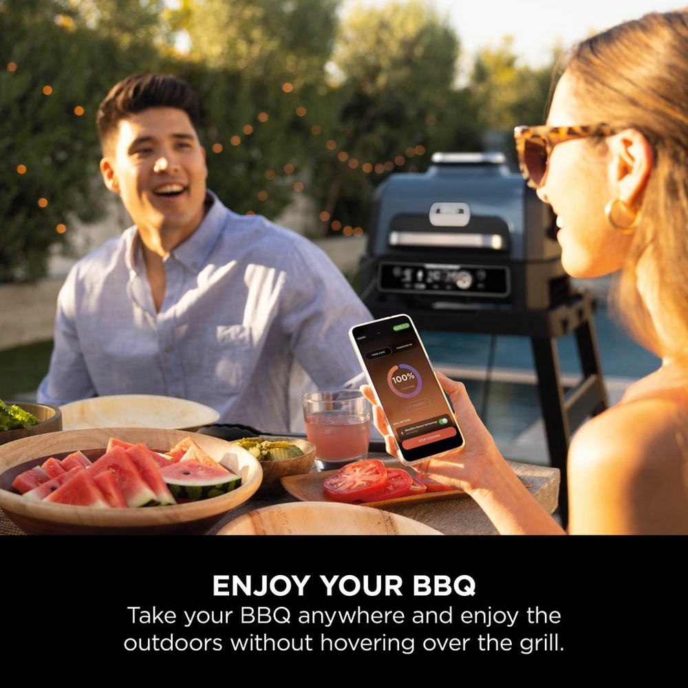 Side view of Ninja OG901UK Woodfire Pro Connect XL Electric BBQ Grill & Smoker - Black/Blue