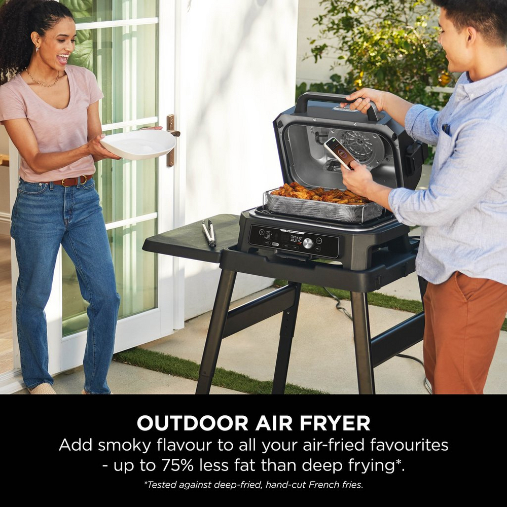 Side view of Ninja OG901UK Woodfire Pro Connect XL Electric BBQ Grill & Smoker - Black/Blue